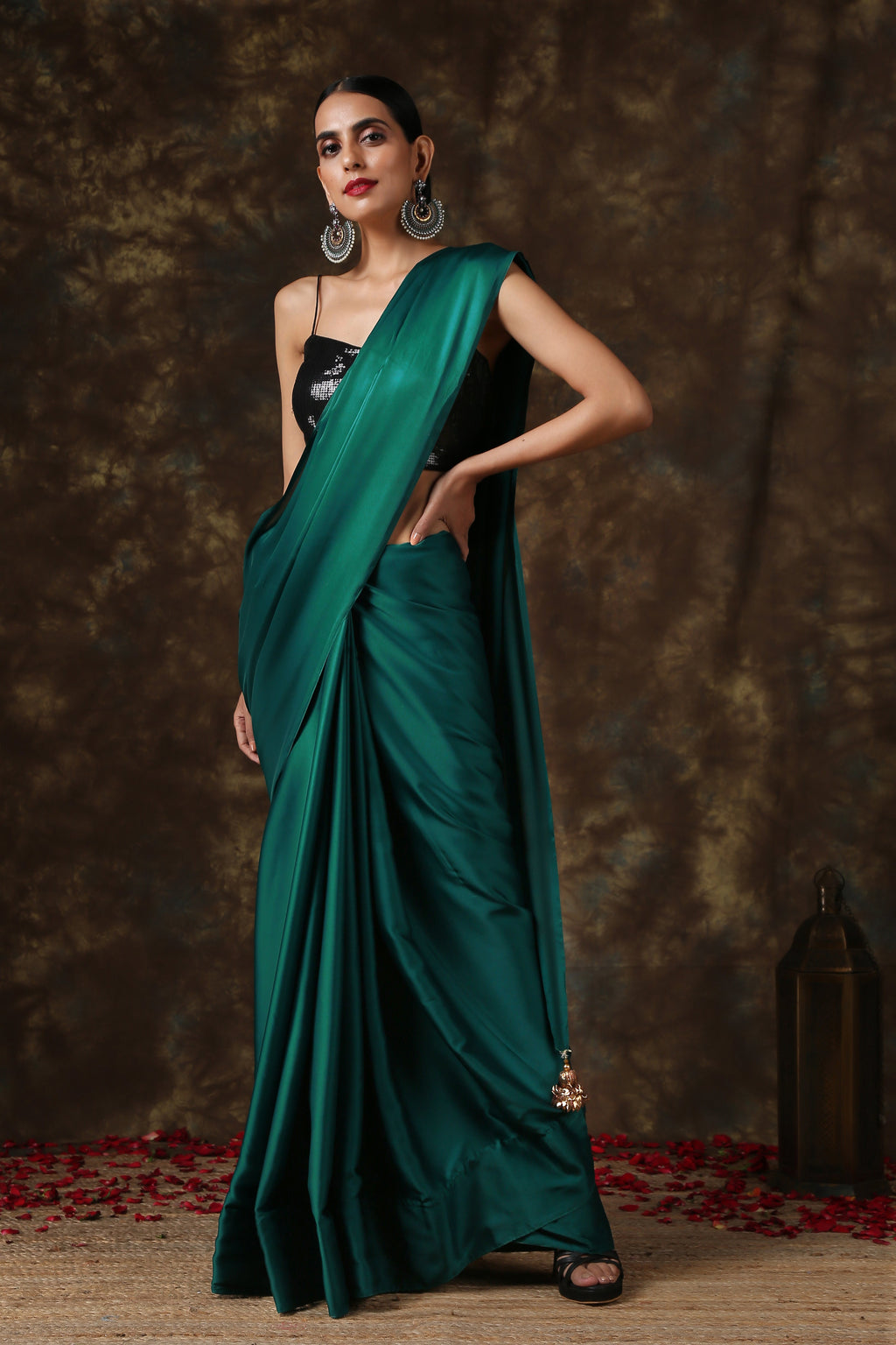 Rich Emerald Green Satin Saree with Bronze Pendants