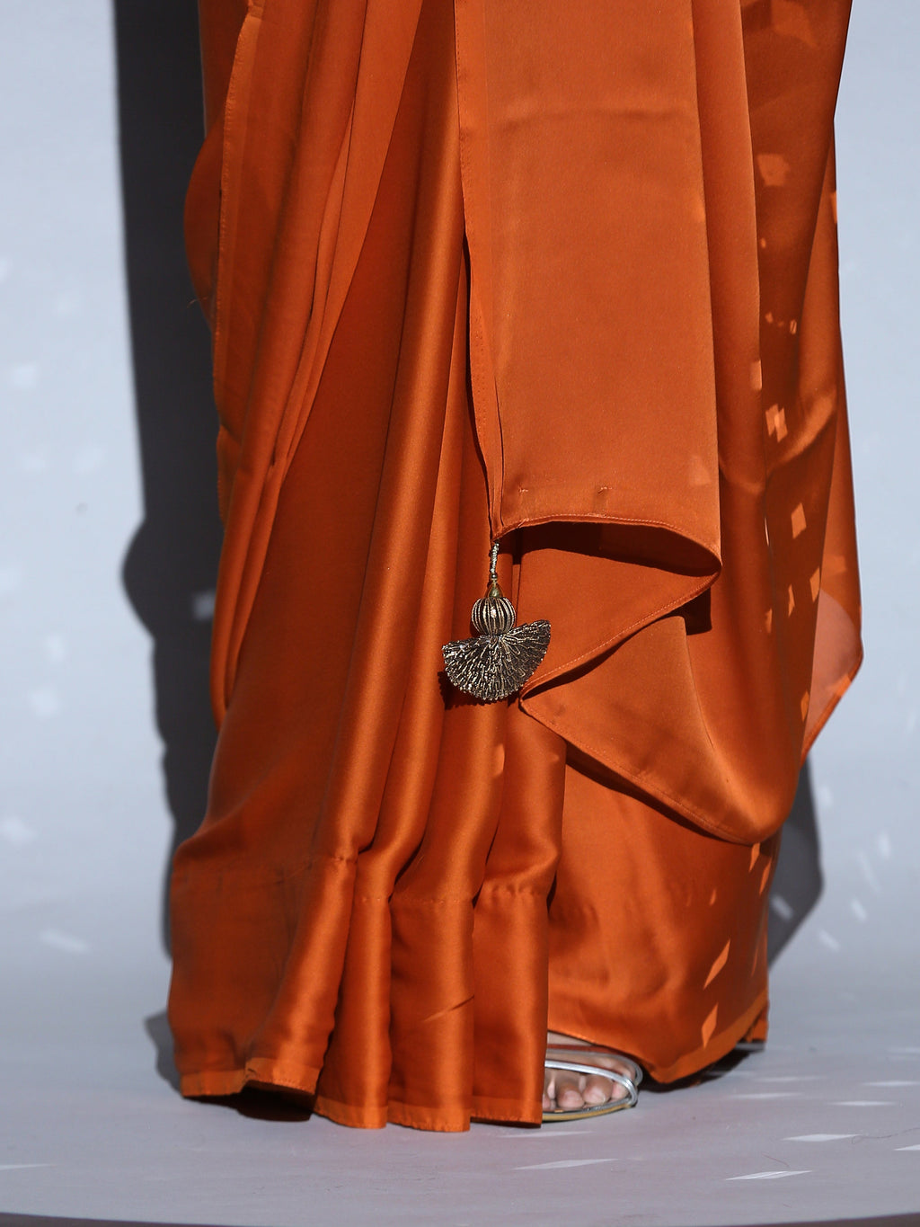 Pumpkin Spice Satin Saree with Pendants